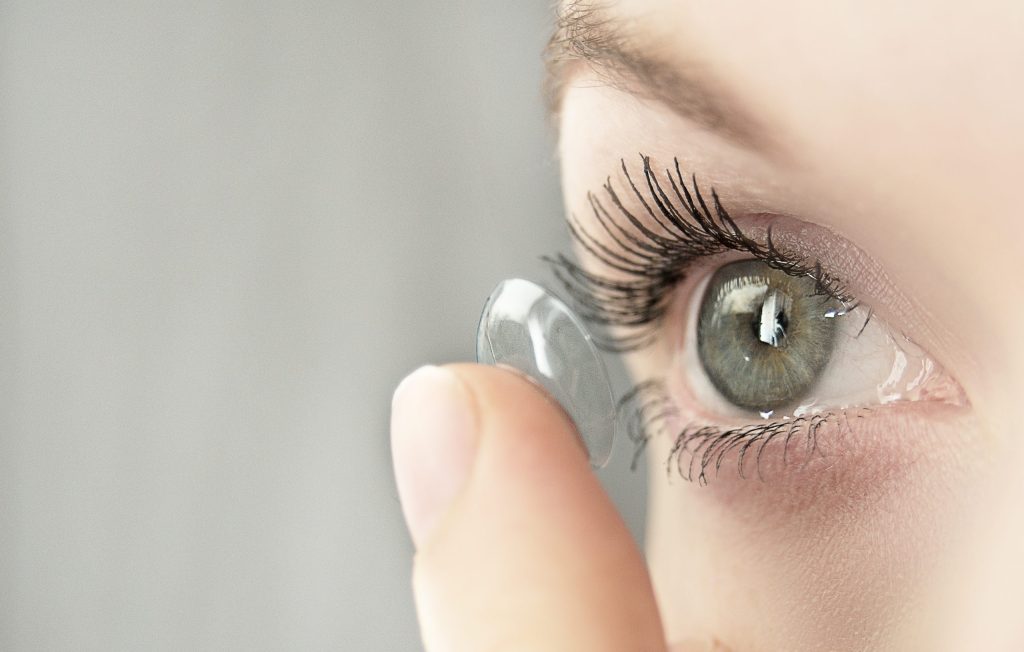 girl wearing soft contact lenses close-up macro